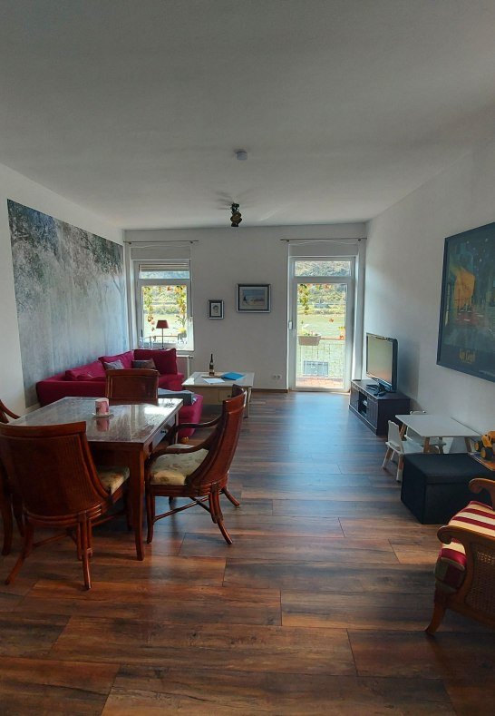 Sterrenberg Wohn- und Esszimmer mit Holzofen | &copy; Heimes